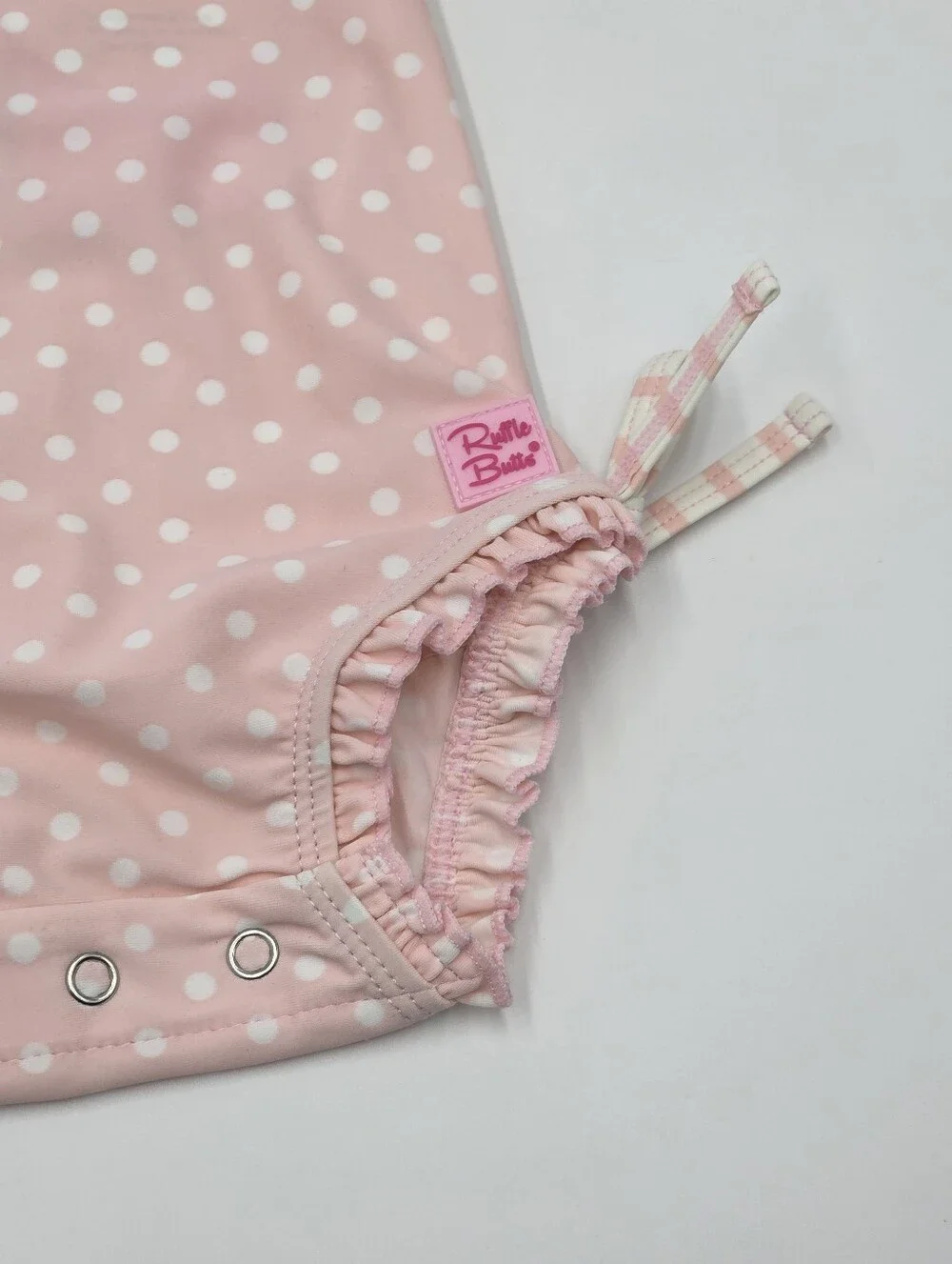 NEW RuffleButts baby girl pink rashguard swimsuit size 3-6 months